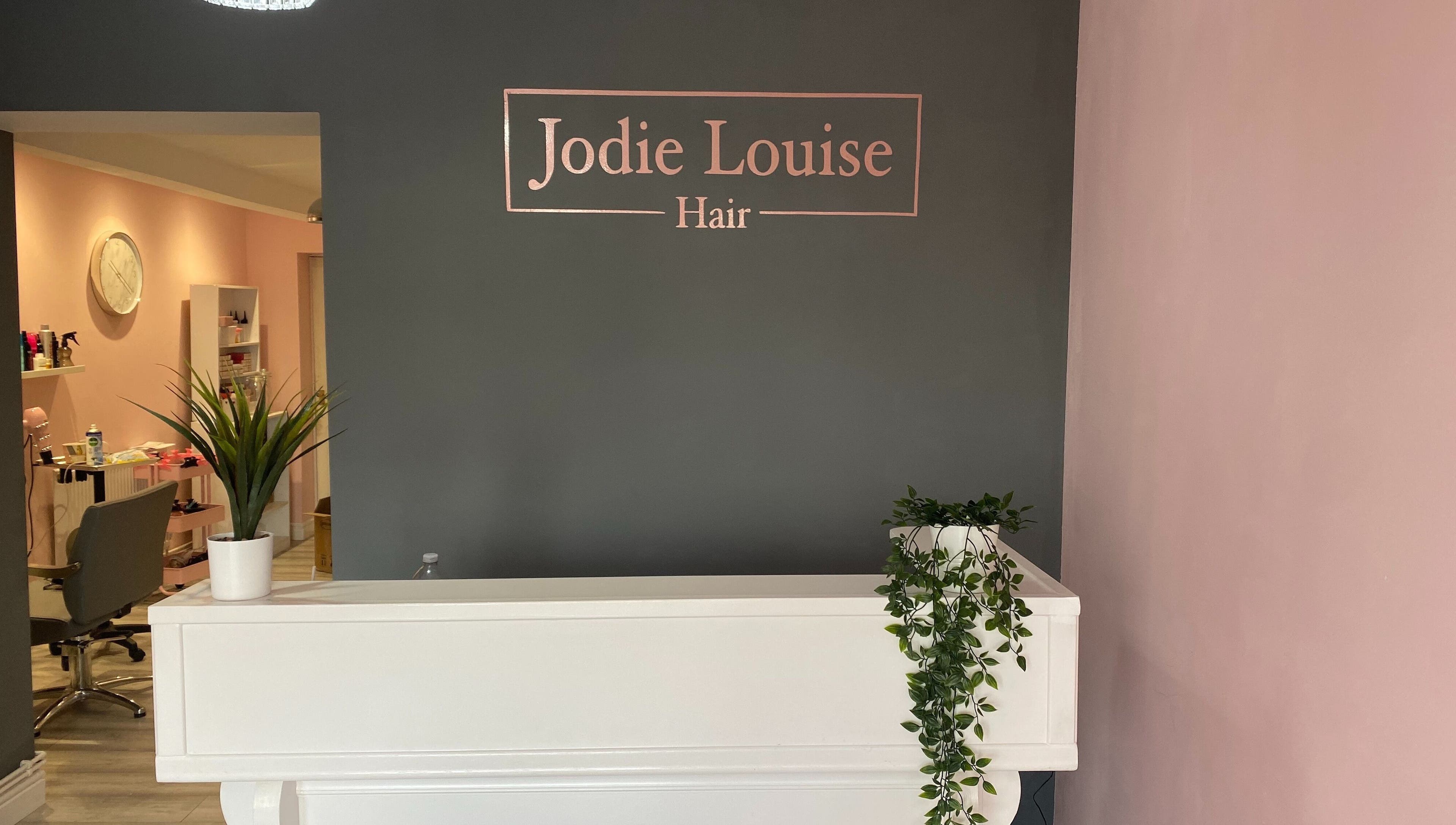 Reception at Jodie Louise Hair, Stourbridge, England, GB with sleek decor and welcoming ambiance.