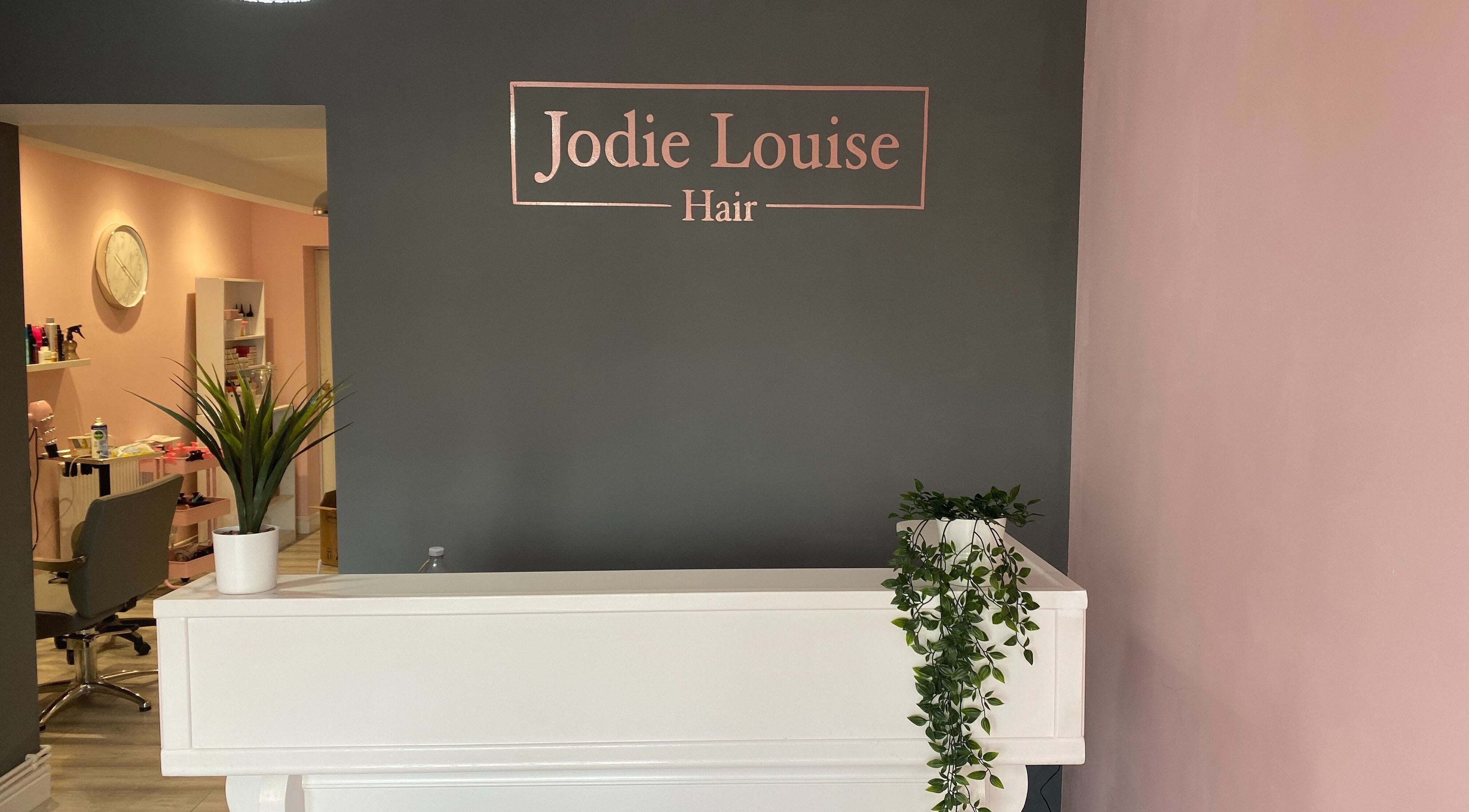 Reception at Jodie Louise Hair, Stourbridge, England, GB with sleek decor and welcoming ambiance.