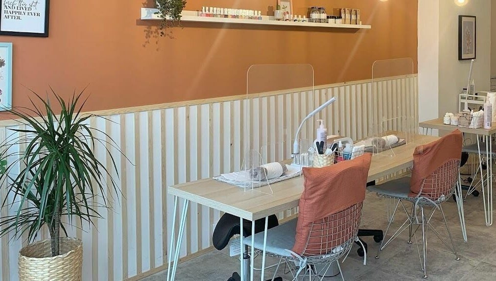 Modern nail studio at Un|Basic, London, England, GB with stylish decor and comfortable seating.