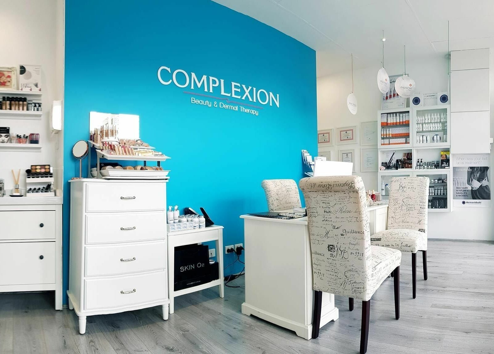 Bright modern interior of Complexion Skin Clinic in Mitcham, Victoria, AU showcasing beauty products and elegant decor.