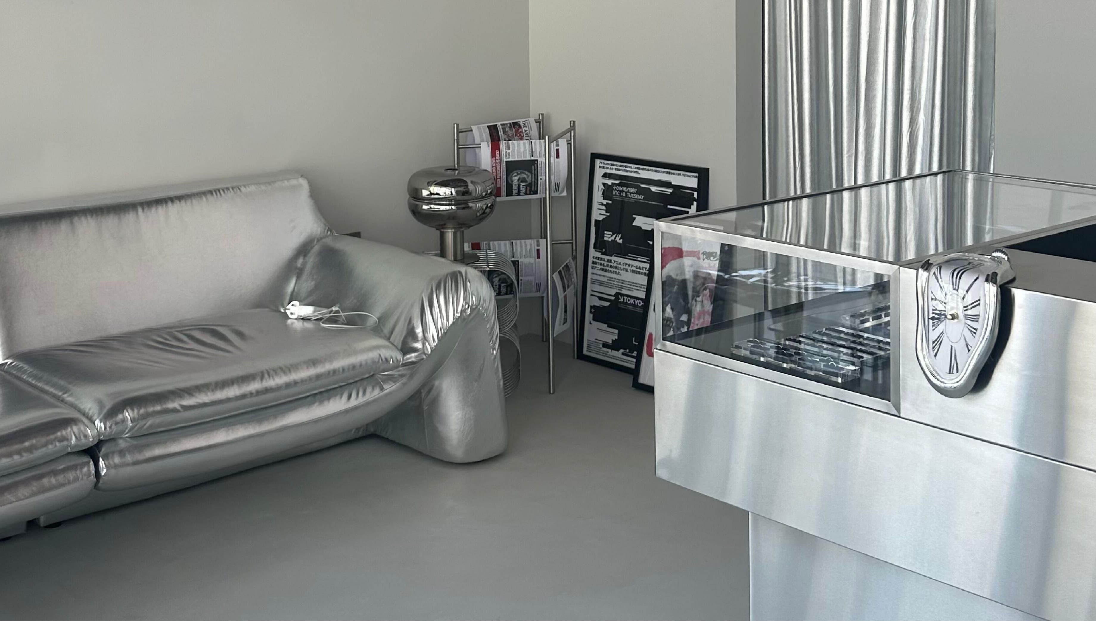 Modern silver lounge at Buco Piercing Parlor, Doha, Doha, QA showcasing stylish and contemporary decor.