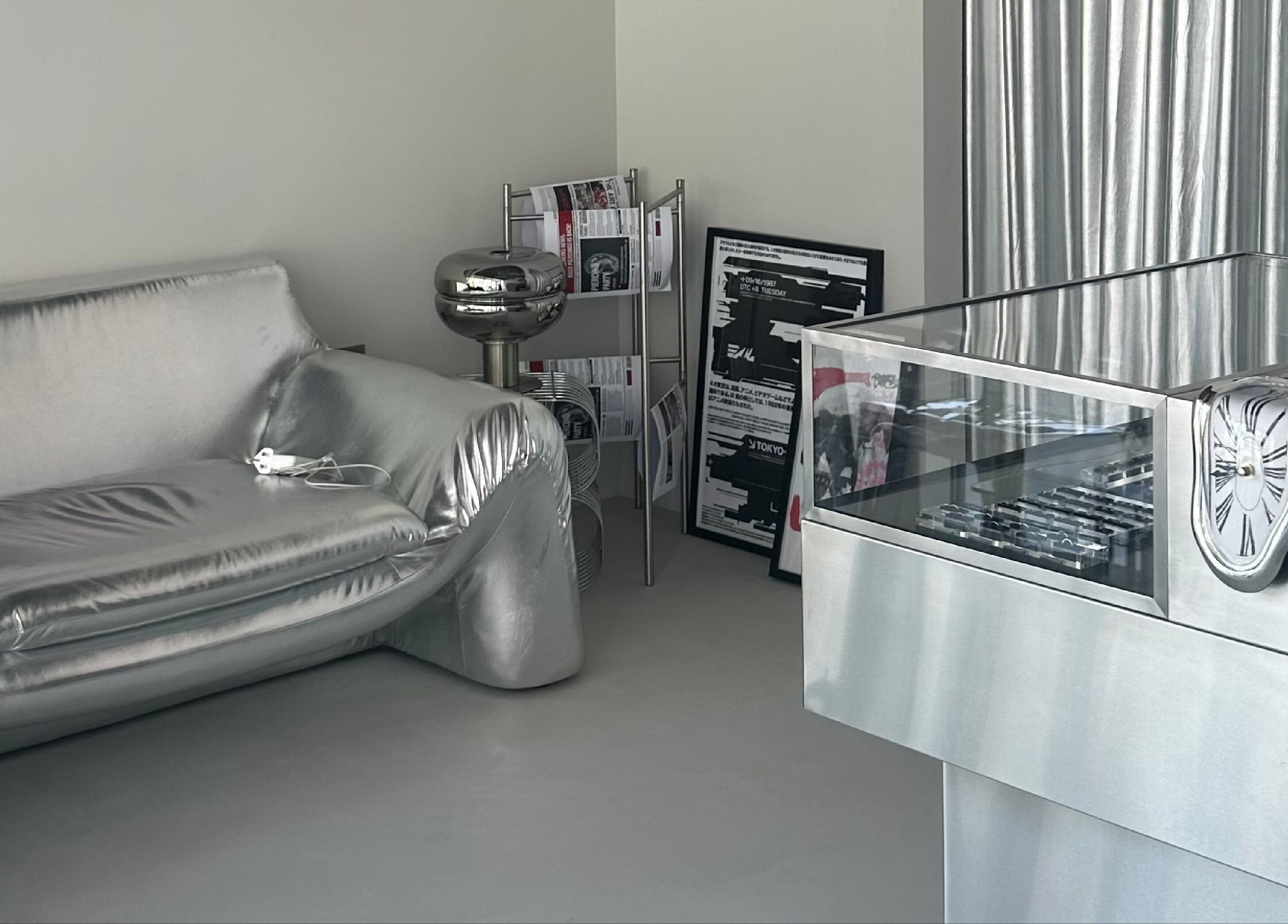 Modern silver lounge at Buco Piercing Parlor, Doha, Doha, QA showcasing stylish and contemporary decor.