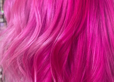 Vibrant pink hair styled at Luxe Hair Beauty Aesthetics, Glasgow, Scotland, GB.