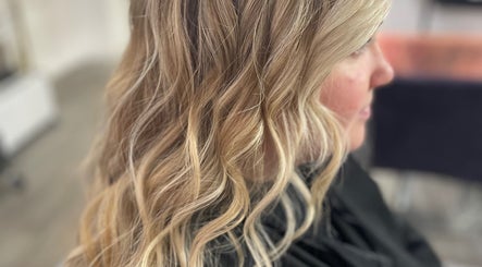Elegant blonde waves styled at Luxe Hair Beauty Aesthetics, Glasgow, Scotland, GB salon.