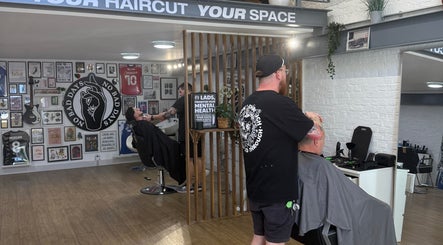 Modern barber setup at No Bad Days in Rochester, England, GB, featuring stylish decor and hair services.