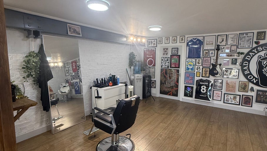 Interior of No Bad Days salon in Rochester, England, featuring modern decor and styling chairs.