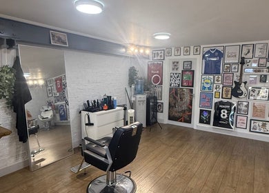 Interior of No Bad Days salon in Rochester, England, featuring modern decor and styling chairs.