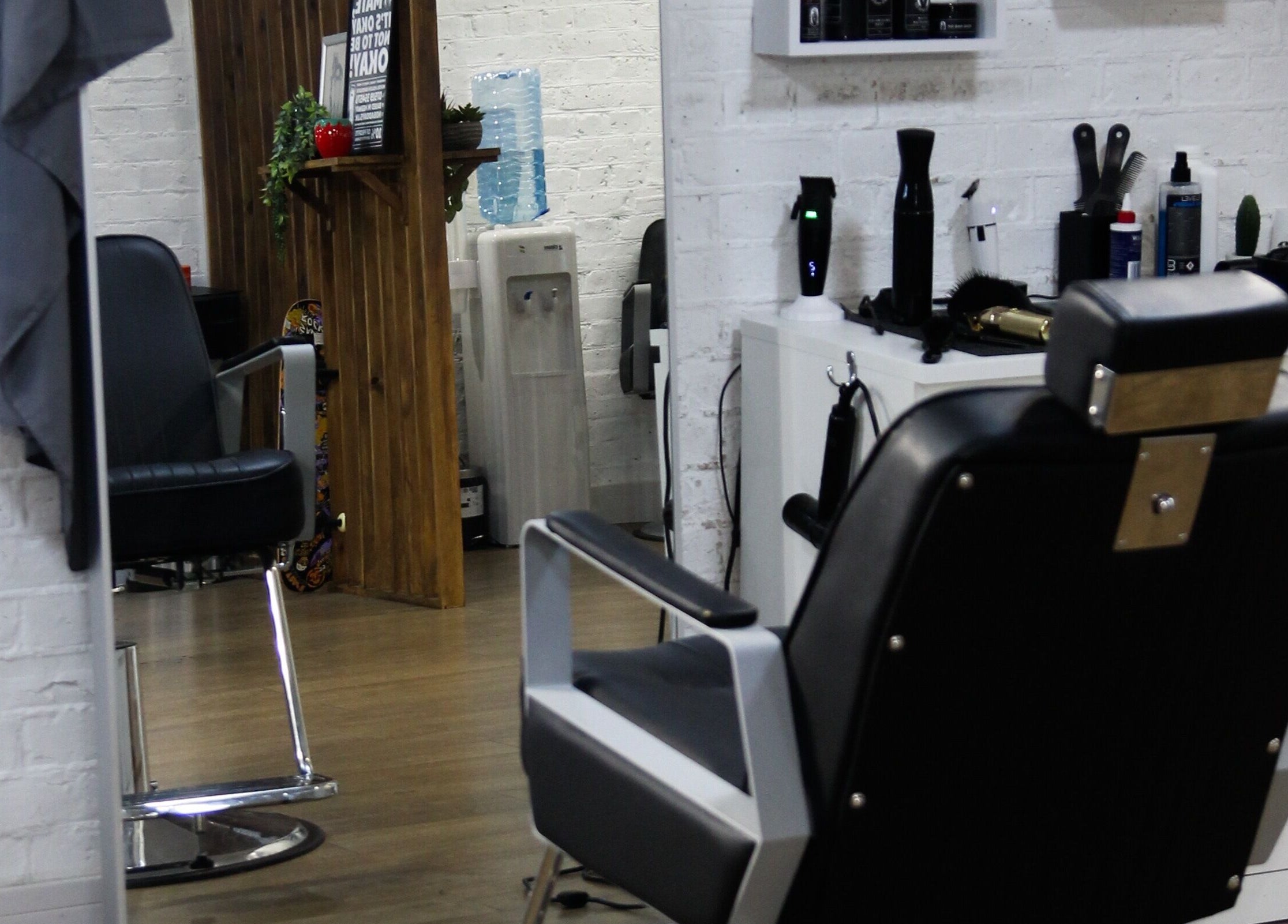 Modern salon chair and styling station at No Bad Days, Rochester, England, GB.