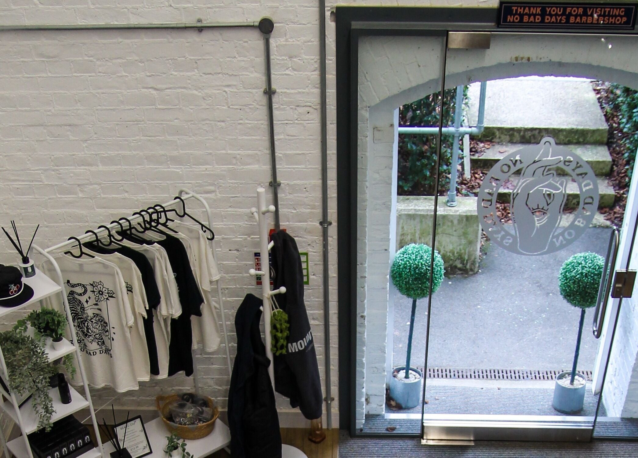 Stylish interior view of No Bad Days in Rochester, England, GB showcasing apparel and modern decor.