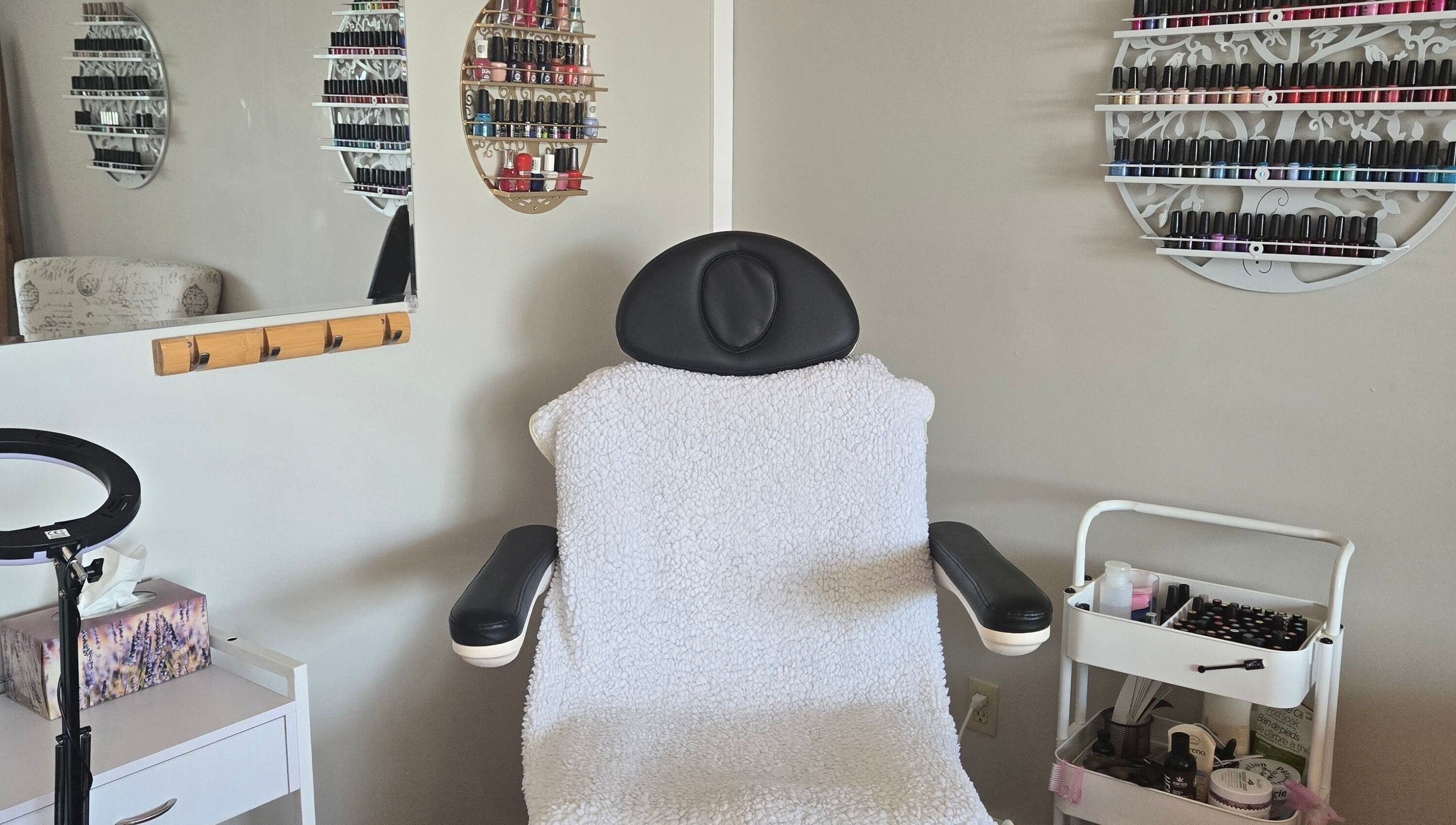 Comfortable spa chair with nail polishes at Tree Treat Spa, Kawartha Lakes, Ontario, CA.