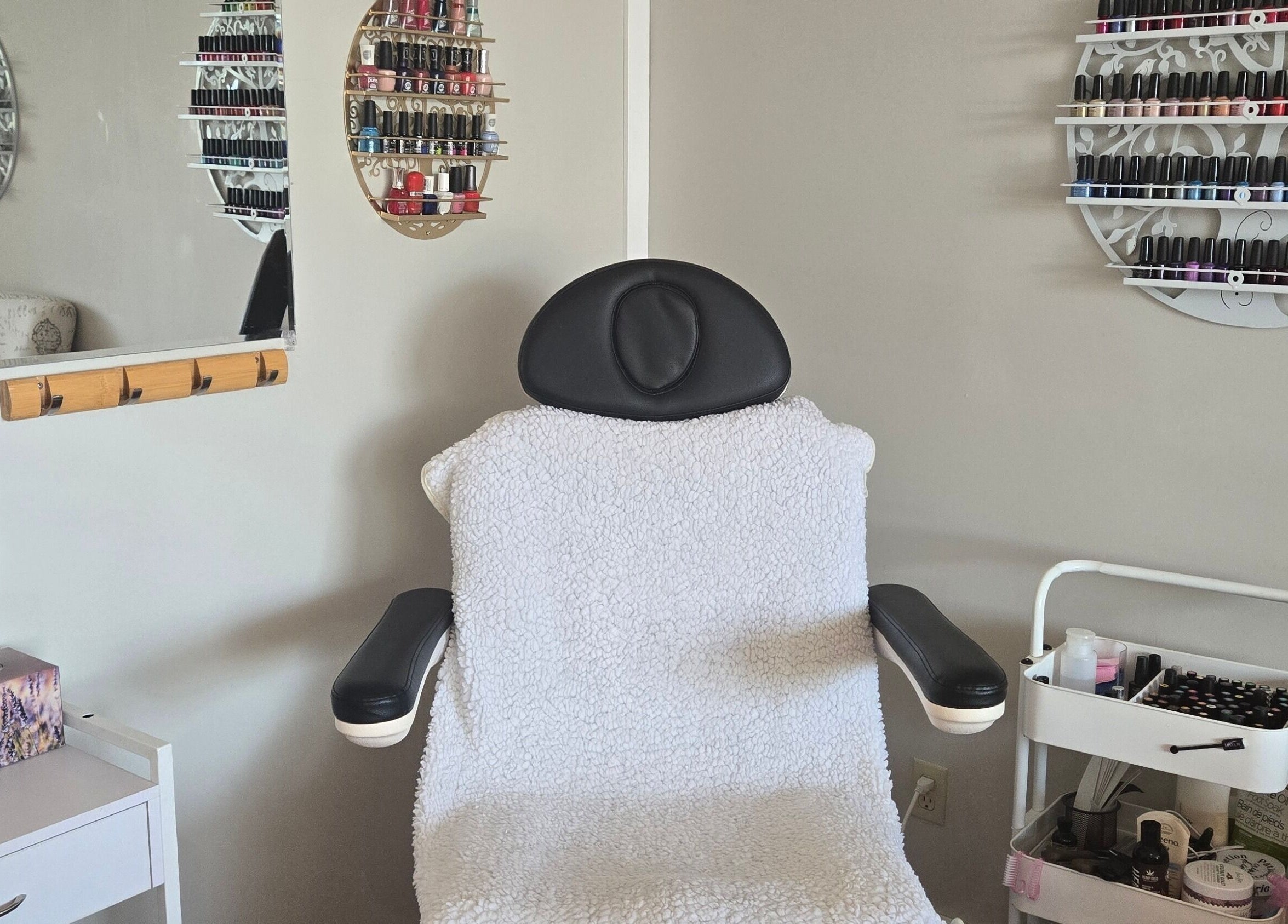 Comfortable spa chair with nail polishes at Tree Treat Spa, Kawartha Lakes, Ontario, CA.