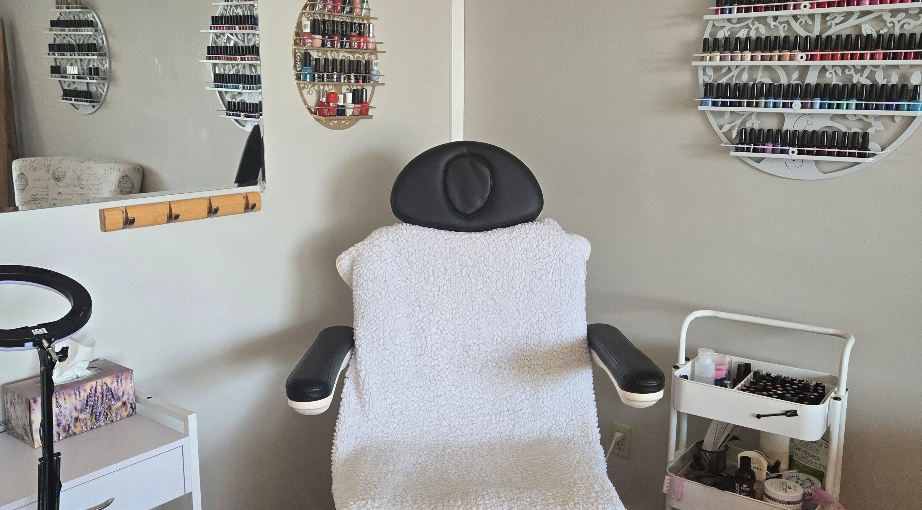 Comfortable spa chair with nail polishes at Tree Treat Spa, Kawartha Lakes, Ontario, CA.