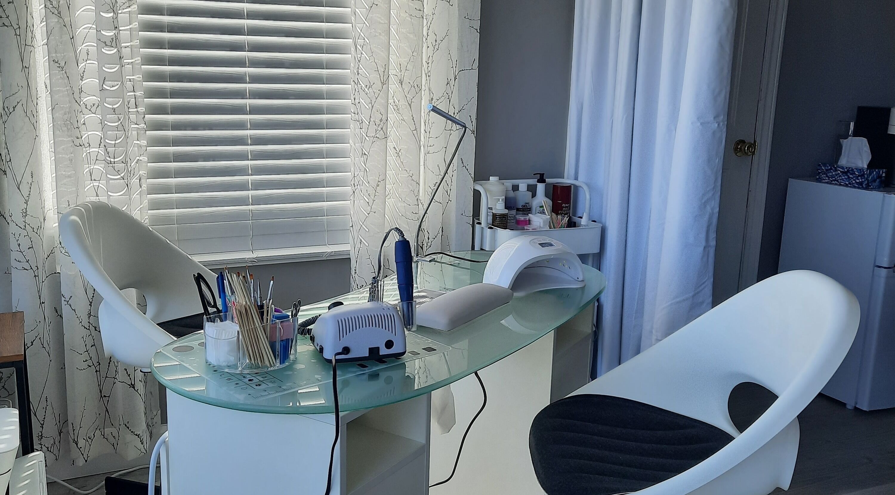 Modern nail station at Tree Treat Spa, Kawartha Lakes, Ontario, CA, featuring sleek design and professional tools.