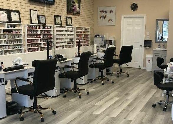 Elegant manicure stations at MyLinh Nails and Spa in Chatham-Kent, Ontario, CA, showcasing nail polish collection.
