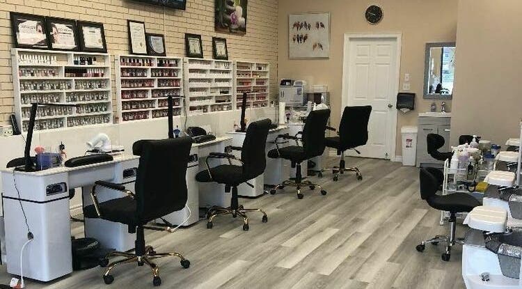 Elegant manicure stations at MyLinh Nails and Spa in Chatham-Kent, Ontario, CA, showcasing nail polish collection.