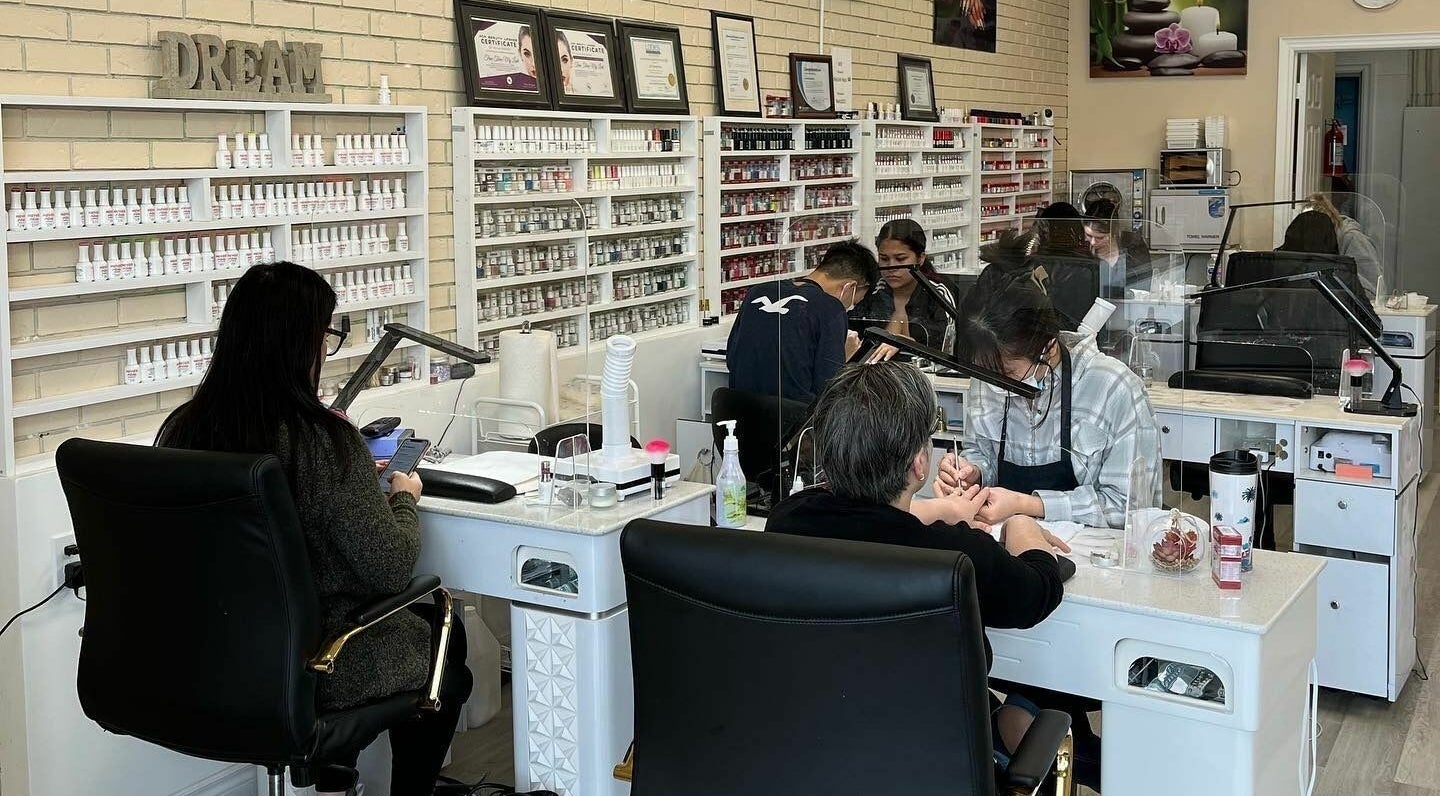 Professionals at MyLinh Nails and Spa, Chatham-Kent, ON, perfecting nail care amidst tranquil ambiance.