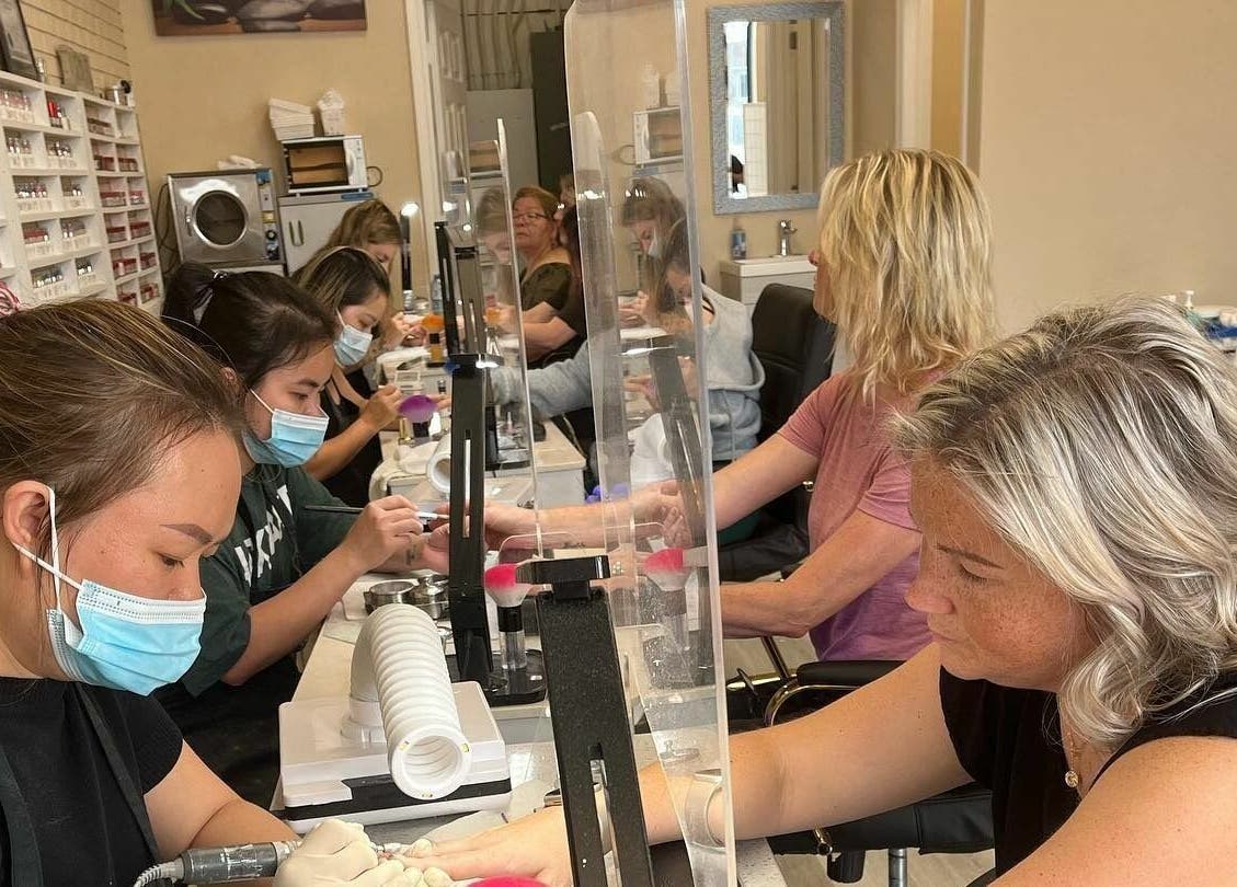 Customers receiving professional nail treatments at MyLinh Nails and Spa, Chatham-Kent, Ontario, CA.
