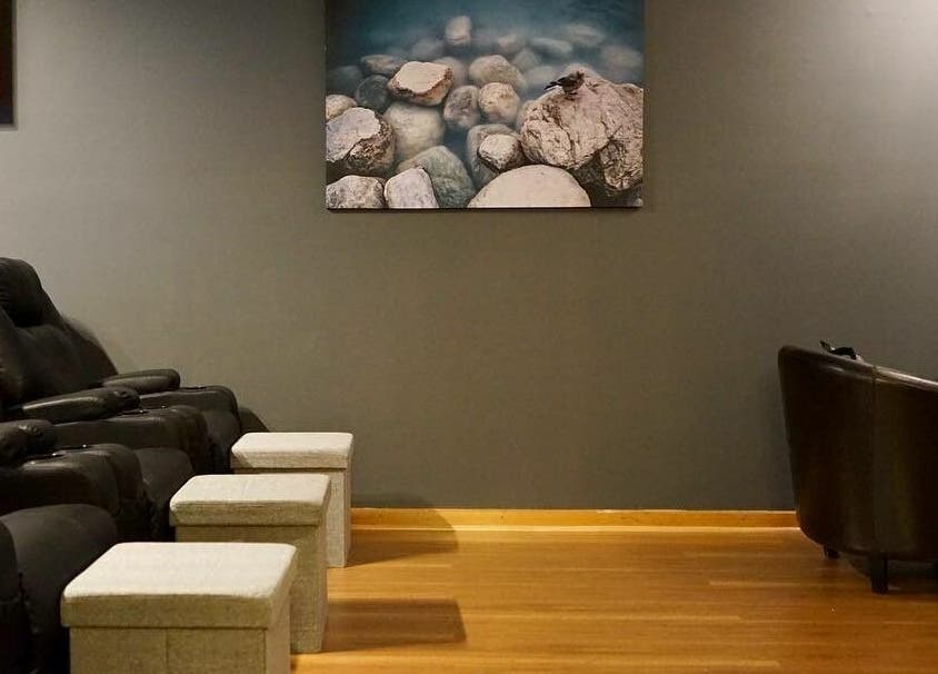 Relaxing lounge chairs at Oceanic Spa Moonah in Moonah, Tasmania, AU, enhancing tranquil wellness ambiance.