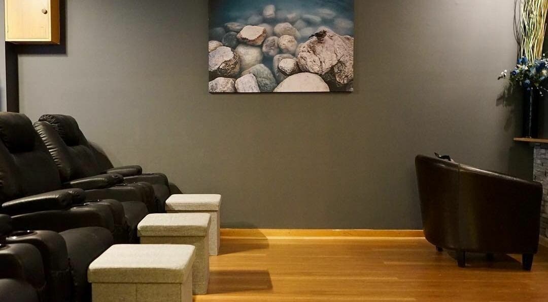 Relaxing lounge chairs at Oceanic Spa Moonah in Moonah, Tasmania, AU, enhancing tranquil wellness ambiance.