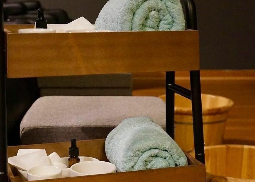 Spa essentials including towels and oils at Oceanic Spa Moonah, located in Moonah, Tasmania, AU.