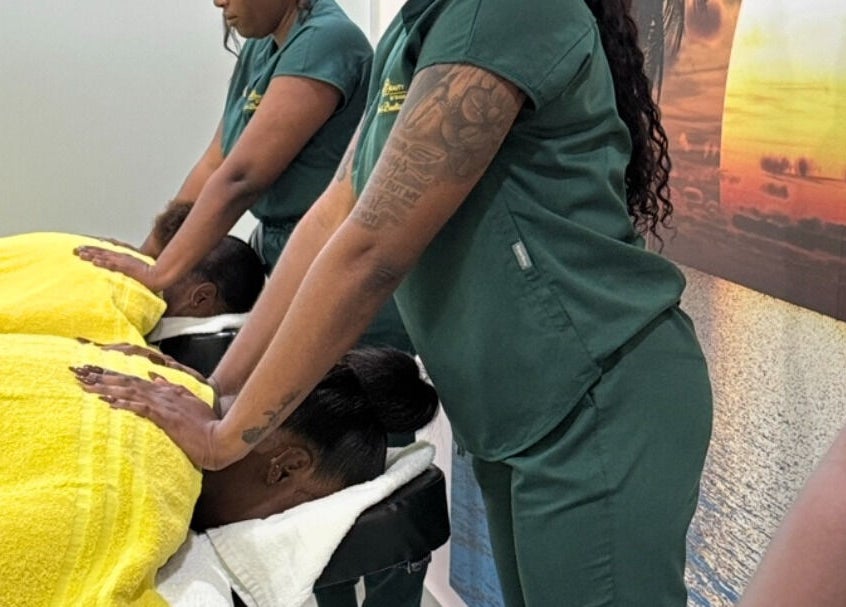 Massage therapists at Highlighted Beauty by Shan Spa, St. Philip, BB, performing relaxing treatments.