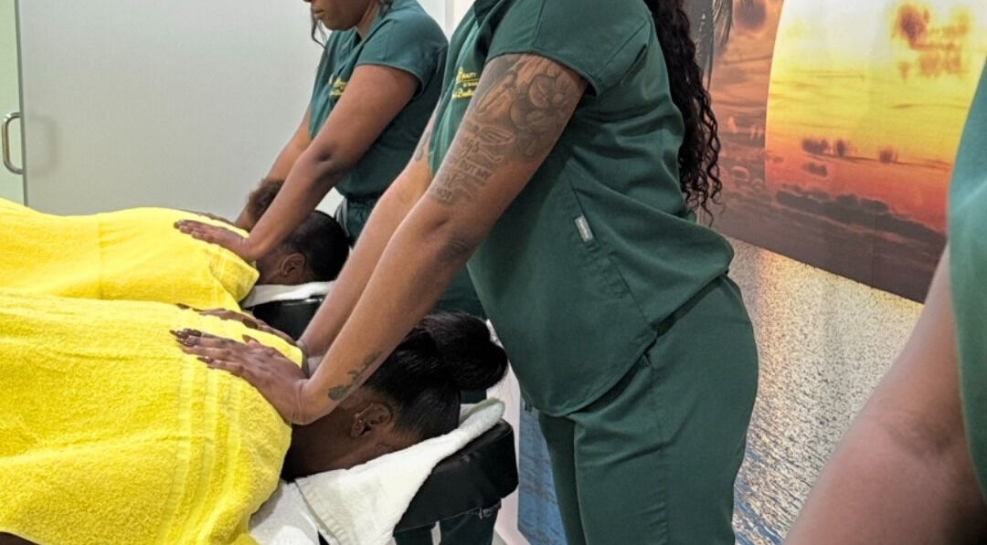 Massage therapists at Highlighted Beauty by Shan Spa, St. Philip, BB, performing relaxing treatments.