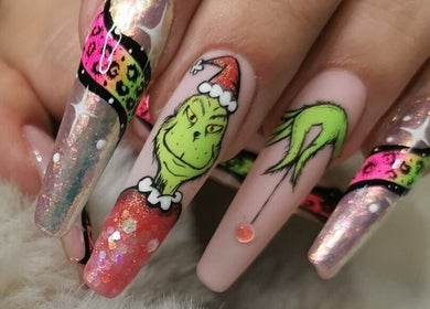 Grinch-themed festive nail art at Nova Bella Beauty, Cape Town, Western Cape, ZA, showcasing detailed designs.