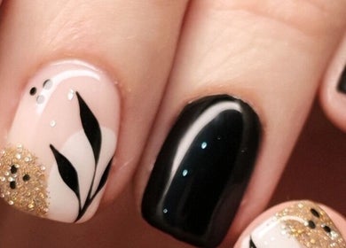 Elegant black and gold nail art at Nova Bella Beauty, Cape Town, Western Cape, ZA.