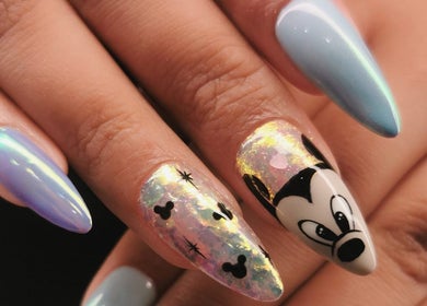 Creative nail art at Nova Bella Beauty, Cape Town, Western Cape, ZA. Features unique designs and colors.