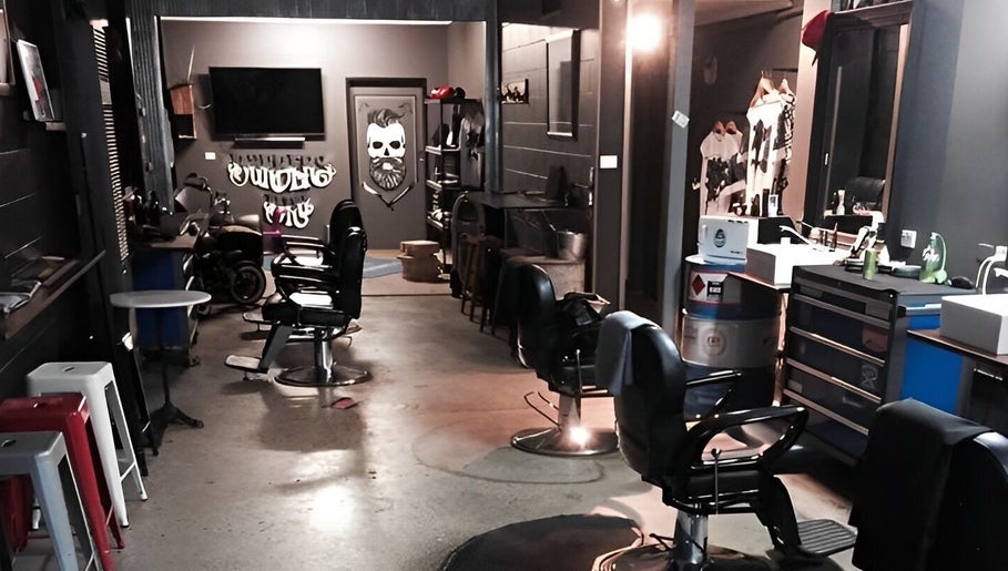Cozy interior of The Barbers Bru in Albury, New South Wales, AU showcasing vintage barber chairs and stylish decor.