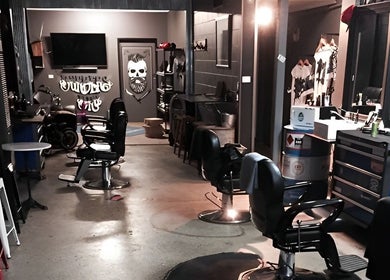 Cozy interior of The Barbers Bru in Albury, New South Wales, AU showcasing vintage barber chairs and stylish decor.