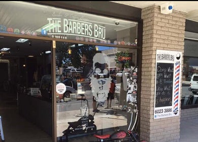 Entrance of The Barbers Bru in Albury, New South Wales, AU, showcasing its stylish street view.