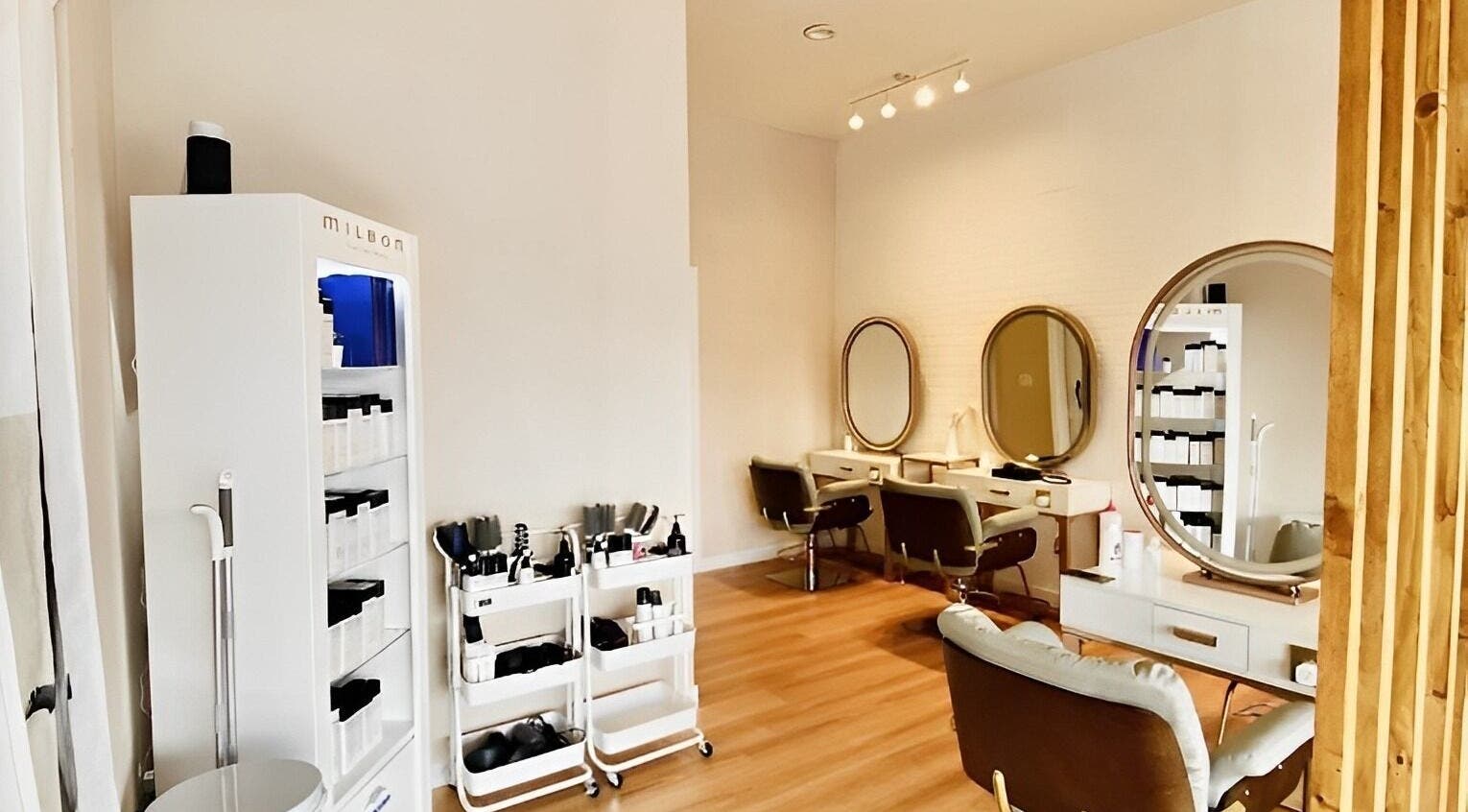 Modern salon interior at Soulo Hair Spa Chinatown, Las Vegas, Nevada, US showcasing elegant mirrors and styling chairs.