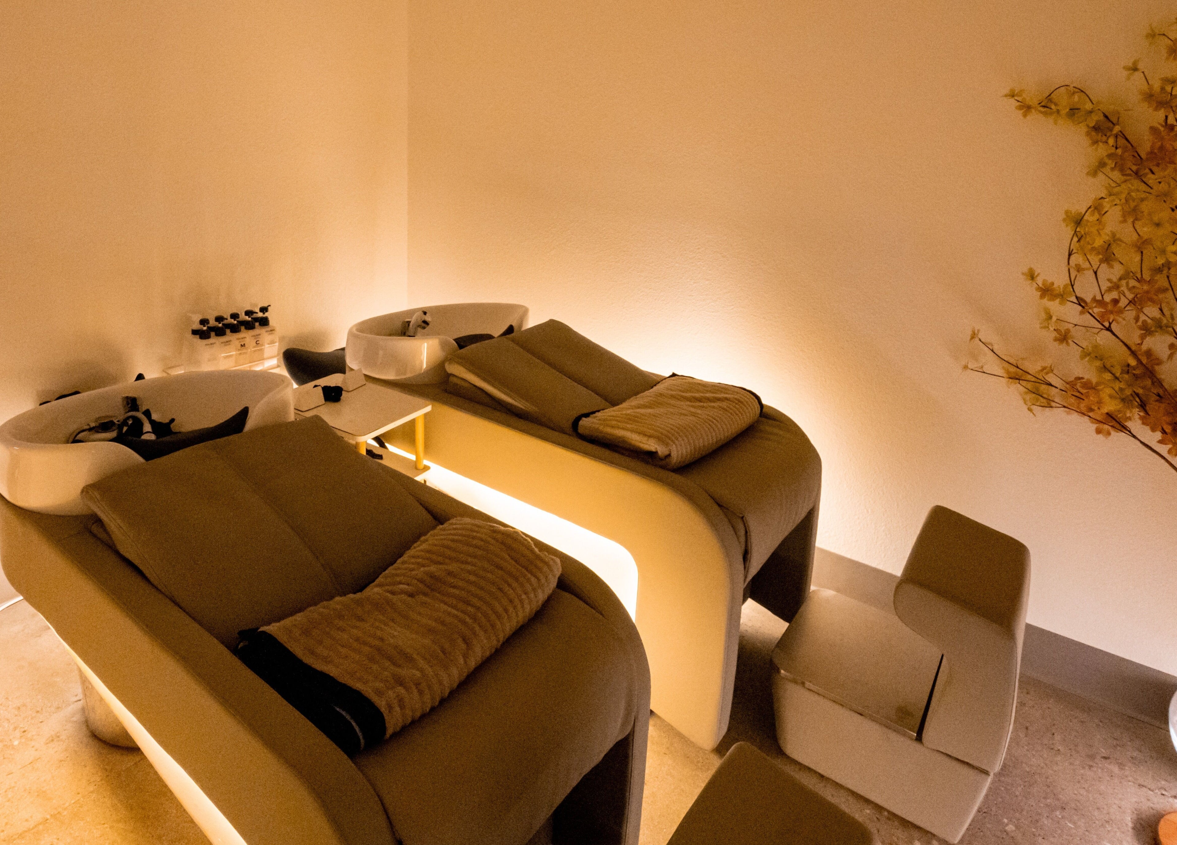 Relaxing hair washing stations at Soulo Hair Spa Southwest, Las Vegas, Nevada, US with cozy ambient lighting.