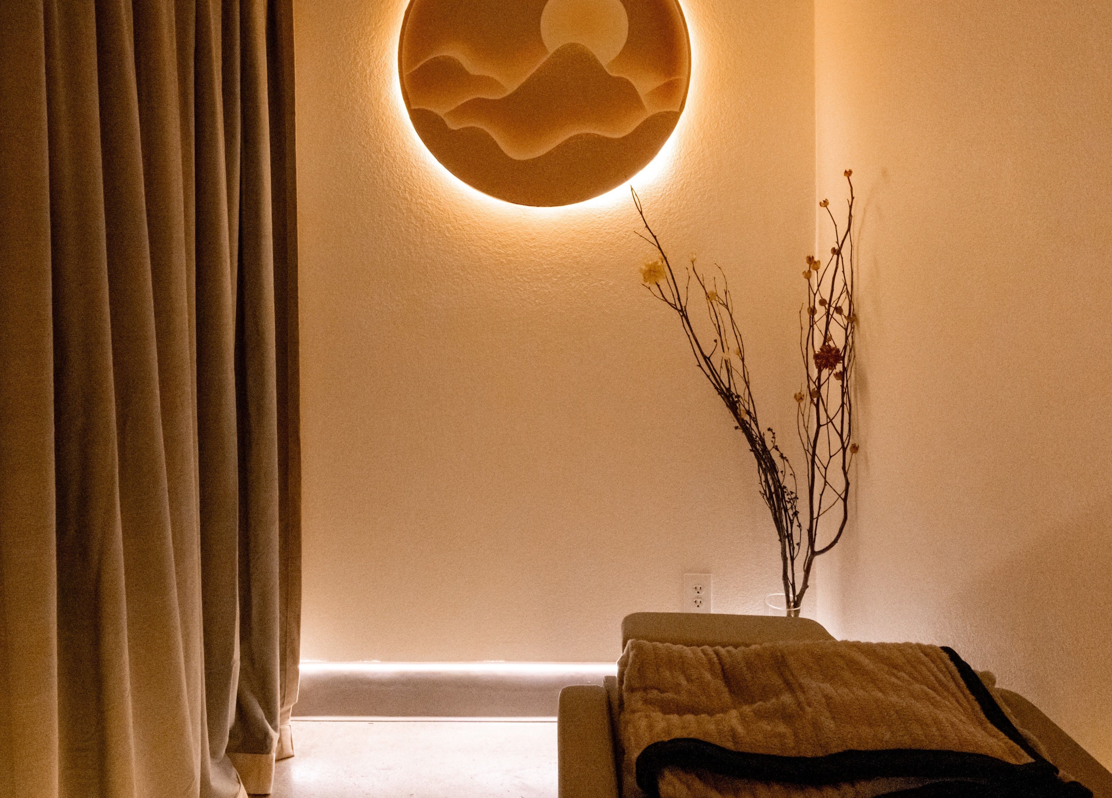 Cozy relaxation room at Soulo Hair Spa Southwest in Las Vegas, Nevada, US with soft lighting and decor.