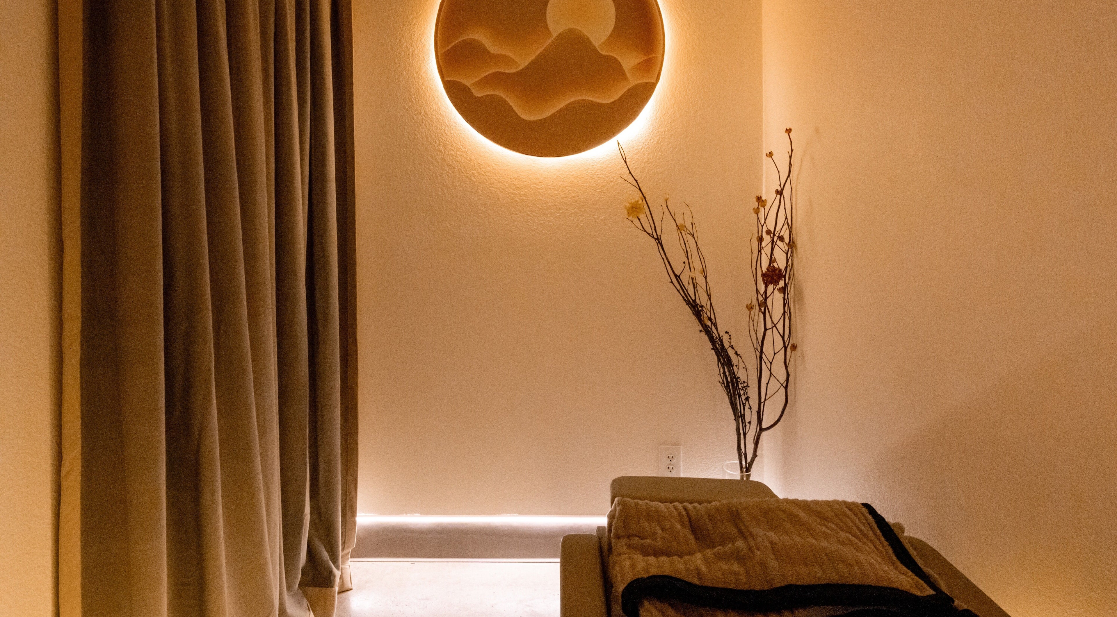 Cozy relaxation room at Soulo Hair Spa Southwest in Las Vegas, Nevada, US with soft lighting and decor.