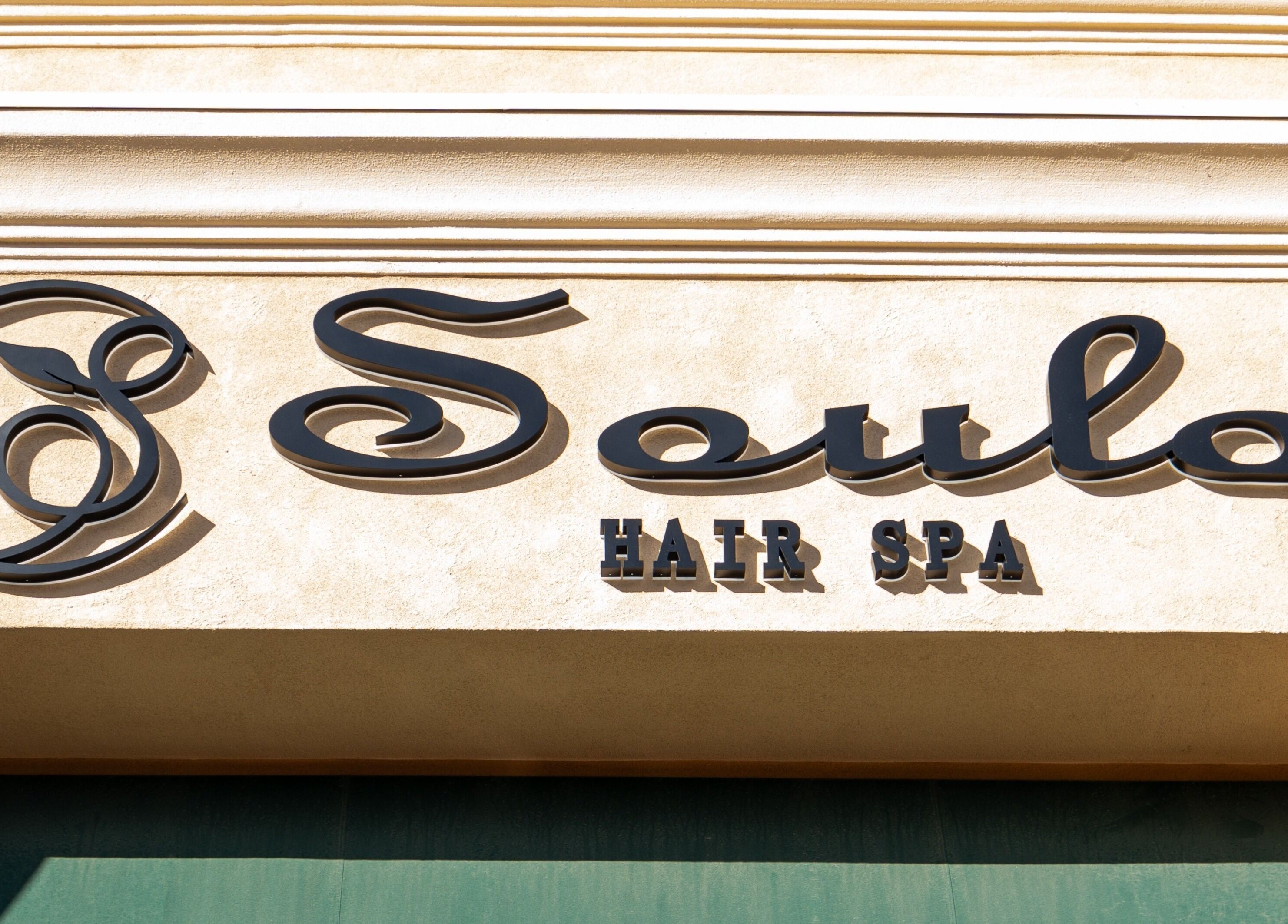Soulo Hair Spa Southwest elegant facade in Las Vegas, Nevada, US under clear sunny skies.