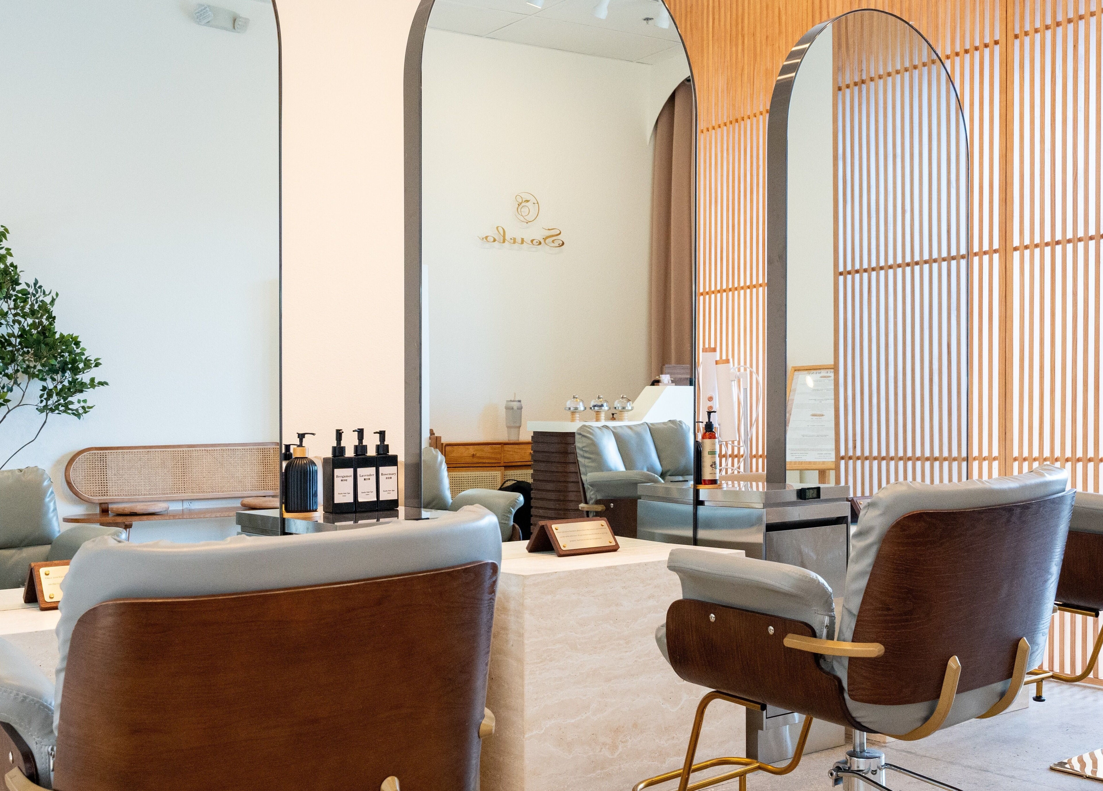 Modern seating at Soulo Hair Spa Southwest in Las Vegas, Nevada, US, showcasing stylish decor and comfort.