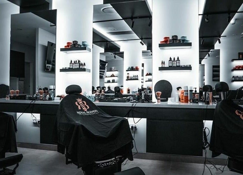 Modern interior of Royal Blends - Gregory Hills, Gledswood Hills, New South Wales, AU with sleek salon chairs.