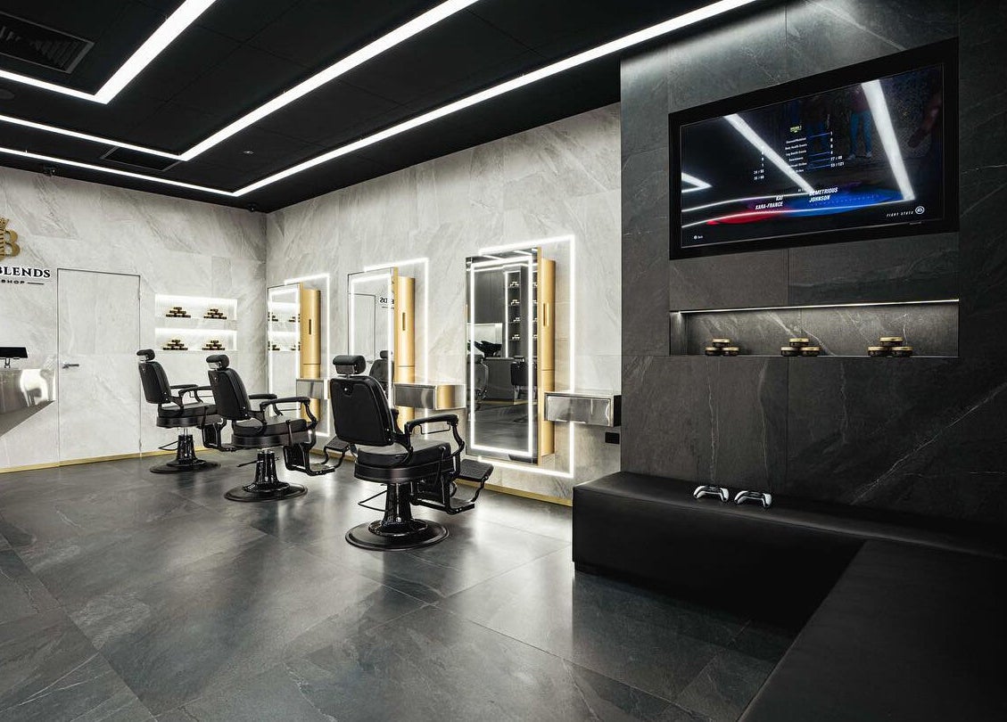 Modern barber chairs and decor at Royal Blends - Casula, located in Casula, New South Wales, AU.