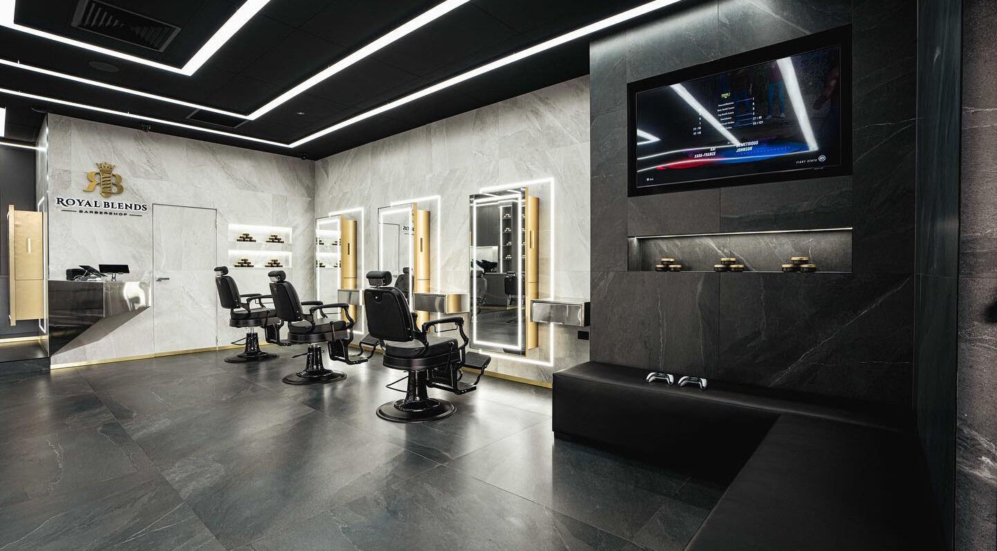 Modern barber chairs and decor at Royal Blends - Casula, located in Casula, New South Wales, AU.