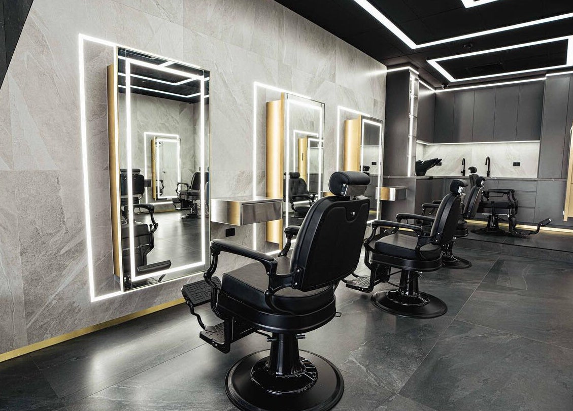 Modern salon interior at Royal Blends - Casula, New South Wales, AU with luxurious styling chairs and mirrors.