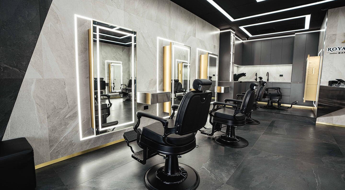Modern salon interior at Royal Blends - Casula, New South Wales, AU with luxurious styling chairs and mirrors.