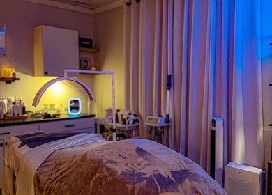 Relaxing treatment room at ANATURALE HOLISTIC SKINCARE STUDIO in Henrico, Virginia, US with soothing lighting.
