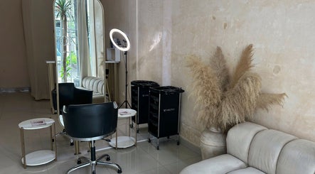 Elegant salon interior at Byron Beauty Lounge in Bali, Bali, ID with plush seating and modern styling equipment.