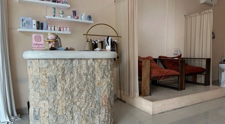 Reception at Byron Beauty Lounge featuring comfy seating and beauty products, Bali, Bali, ID.