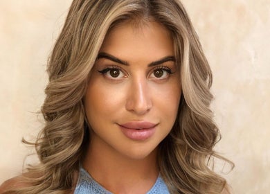 Close-up of a woman with styled hair at Byron Beauty Lounge, Bali, Bali, ID.