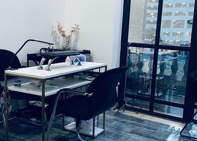 Chic nail station at Blackdime Beauty Bar in Johannesburg, Gauteng, ZA, with modern decor and natural light.