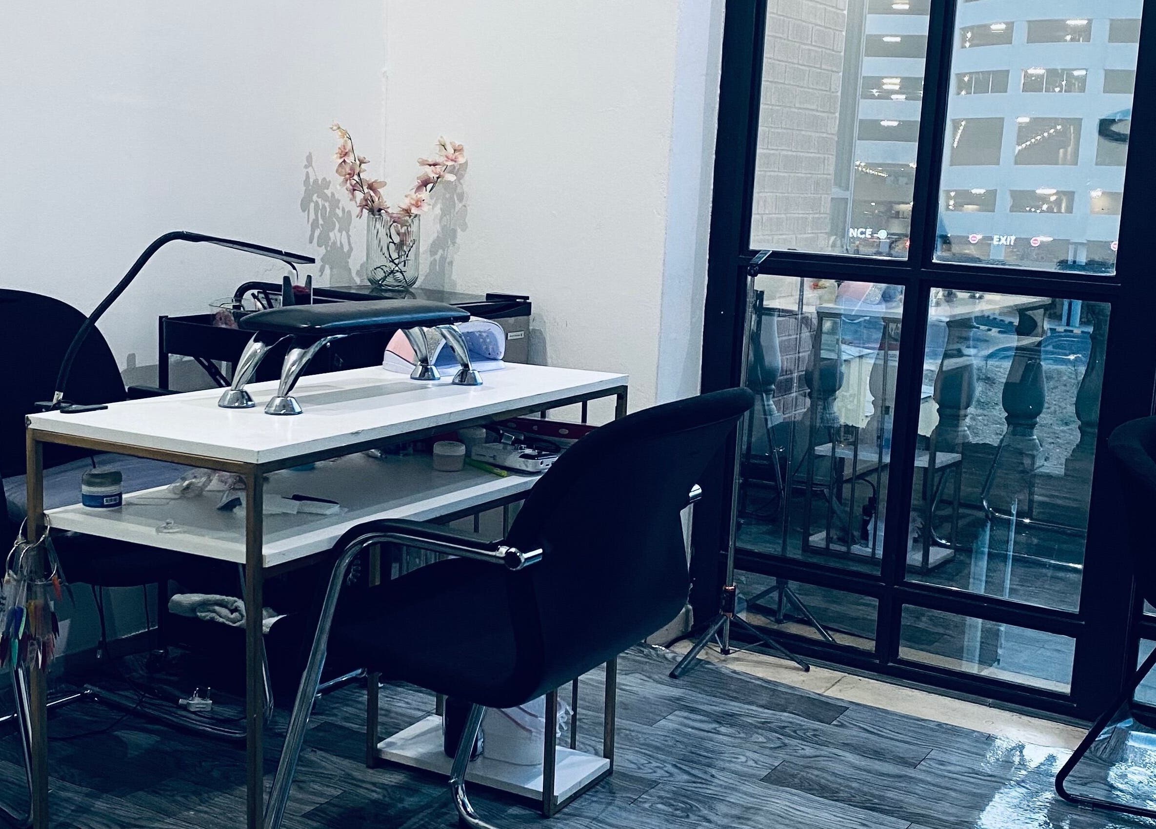 Chic nail station at Blackdime Beauty Bar in Johannesburg, Gauteng, ZA, with modern decor and natural light.