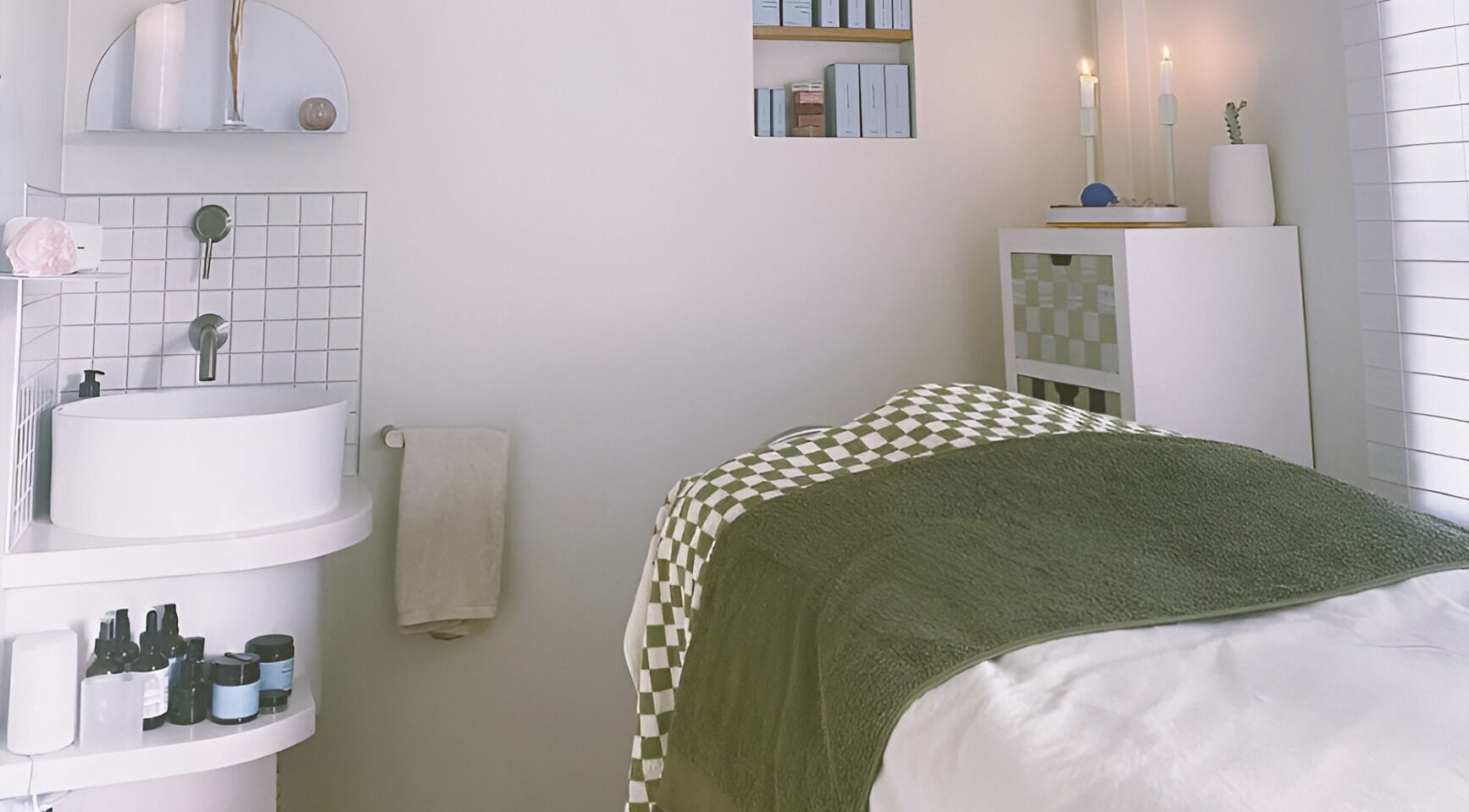 Peaceful treatment room at Innerbloom Holistic Skin Studio, Auckland, Auckland, NZ featuring a cozy bed.